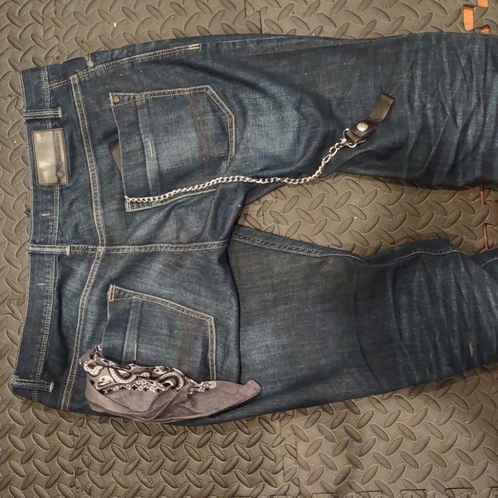 CALVIN KLEIN Faded ROCKERS.  Back pocket hole Tailored knees. Original piece.